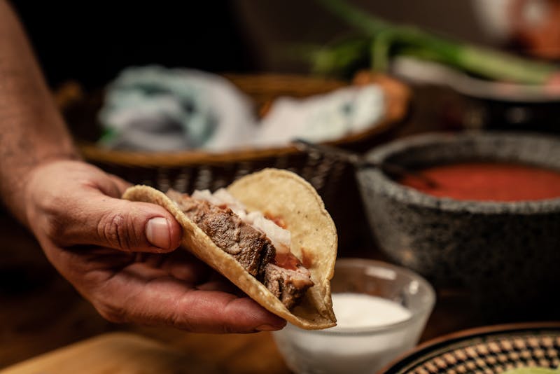 Birria Beef Tacos with consomme dipping broth